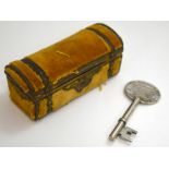 TWO ITEMS, to include a key and a small novelty trunk, key reads 'Presented by ALDE W PARKINSON PRES