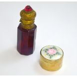 TWO ITEMS, to include a ruby glass perfume bottle and a small pill box