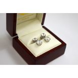 A PAIR OF CUBIC ZIRCONIA EARRINGS