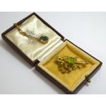 TWO TURN OF THE CENTURY PIECES OF JEWELLERY, to include an aquamarine pendant necklace, together