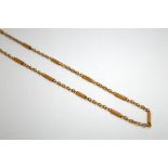 A 9CT ROSE GOLD FANCY CHAIN, with a junction design square shape bar accents, stamped 9k, length