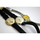 THREE WATCHES, to include two watches with leather straps and a stainless steel strapped Longines