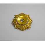 A VICTORIAN STYLE BROOCH, with old mine cut gemstone to a fancy surround, with reverse vacant
