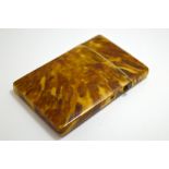 A CARD CASE OF TORTOISESHELL EFFECT, on bone, with push pin clasp, approximately 8.5cm x 5.5cm