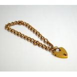 A 9CT ROSE GOLD HEART SHAPE PADLOCK BRACELET, length 15cm, stamped 9ct, approximate weight 5 grams