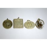 FOUR PENDANTS, with flower and entwined love heart motifs, together with a mother and child
