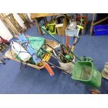 A WHEEL BARROW, lawn seeder, airator and various tools