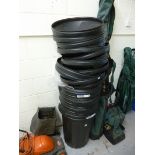 FOUR PLASTIC DUSTBINS, and a quantity of lids