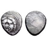 Etruria, Populonia AR 20 Asses. 3rd century BC. Facing head of Metus, tongue protruding, hair