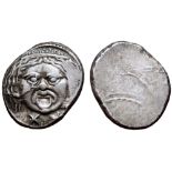 Etruria, Populonia AR 20 Asses. 3rd century BC. Facing head of Metus, tongue protruding, hair