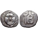 Etruria, Populonia AR 20 Asses. 3rd century BC. Facing head of Metus, tongue protruding, hair