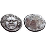 Etruria, Populonia AR 20 Asses. 3rd century BC. Facing head of Metus, tongue protruding, hair