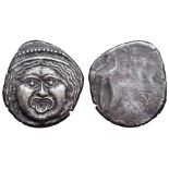 Etruria, Populonia AR 20 Asses. 3rd century BC. Facing head of Metus, tongue protruding, hair