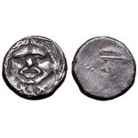 Etruria, Populonia AR 20 Asses. 3rd century BC. Facing head of Metus, tongue protruding, hair