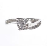 18 CT WHITE GOLD DIAMOND SOLITAIRE RING WITH DIAMOND TWIST SHOULDERS