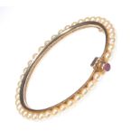 GOLD CULTURED PEARL BANGLE WITH RUBY CLASP