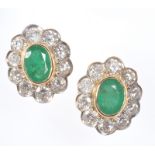 PAIR OF 18 CT OVAL CUT EMERALD & DIAMOND CLUSTER EARRINGS