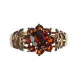 9 CT GOLD AND GARNET CLUSTER RING