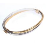 9 CT WHITE AND YELLOW GOLD BANGLE