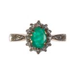 9 CT GOLD EMERALD AND DIAMOND CLUSTER RING