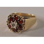 A 9ct gold and garnet dress ring, 1970s,