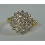 A 9ct gold and diamond set cluster ring,