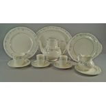 A Royal Doulton porcelain part dinner an