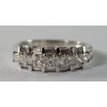 A platinum and diamond set ring, with a