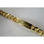 An 18ct gold identity bracelet, engraved Ritchard, approx 20.5cm, approx 33.6g.  CONDITION REPORT: