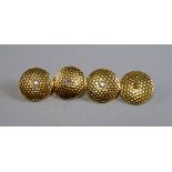A pair of 18ct gold and diamond set gentleman's cufflinks, of circular planished form, set with a