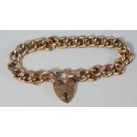 A 9ct gold curb link bracelet with padlock clasp, approx 20cm, approx 18.5g. CONDITION REPORT: