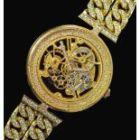 A Fine and Unique 18ct gold and diamond set gentleman's skeleton wrist watch by Corum, the manual