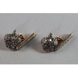 A pair of Russian 56 standard gold and diamond set cufflinks, St. Petersburg, each in the form of