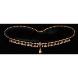 A Victorian pearl and diamond set fringe necklace, each link with a collet set seed pearl,the