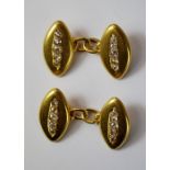 A pair of 18ct gold and diamond set gentleman's cufflinks, of naïveté  form, each link with a