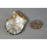 A gold mounted shell with pearl pendant, the pearl approx 8mm diameter, the shell approx 6cm,