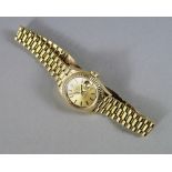 A Rolex 18ct gold Oyster Perpetual Datejust ladies wrist watch, gold face and batons, with