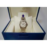 A gentleman's Concord Saratoga wrist watch, 1999, silvered textured  dial and bracelet strap, boxed,