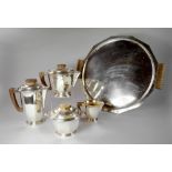 A French Art Deco silver plated five piece tea and coffee set by Boulenger, comprising dodecagon