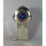 A Liberty and Co Tudric pewter and enamel clock designed by Archibald Knox, c.1900-1910, the blue