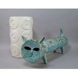 A large pottery stylized cat, in the style of Bisrosi, decorated with turquoise blue glaze,