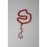 Coral and diamond string of Subuh beads, Middle Eastern, second half 20th century, the coral prayer