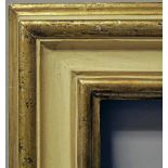 A Parcel Gilt and White Painted Moulding