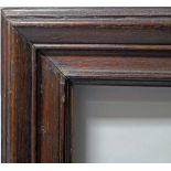 An Italian Oak Moulding Frame, 18th century, with cavetto sight, plain frieze and rounded wedge