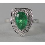 A 14ct white gold, emerald and diamond s