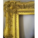 A Gilt Composition Louis XV Style Frame,