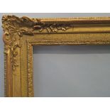 A Gilt Composition Louis XIV Style Frame