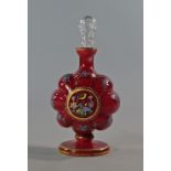 A Continental overlaid glass decanter and stopper, late 19th century, the body of lobed form with