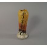 A French glass vase, 20th century, decorated in the manner of Daum, with a continuous landscape of