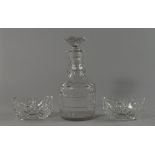 A Georgian cut glass decanter, with stopper, cut with faceted and geometric decoration, 23cm high,